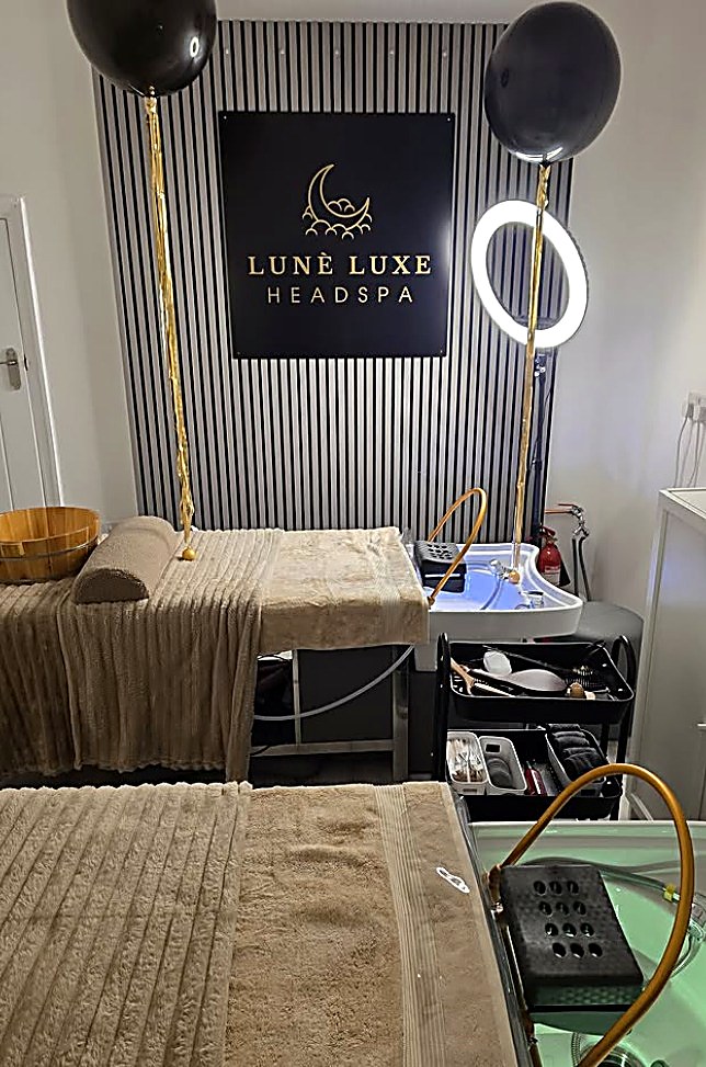 Twin head spa beds beneath the Lunè Luxe sign