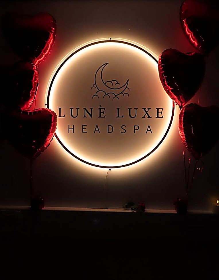 Our glowing moon sign, dressed for a romantic evening
